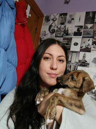 Con Ares, un perrito que tuve en acogida🐶